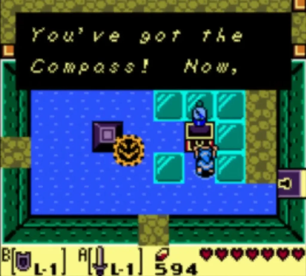 Link at the chest in the water room with the You've got the Compass message on screen. Link at the chest in the water room with the You've got the Compass message on screen.