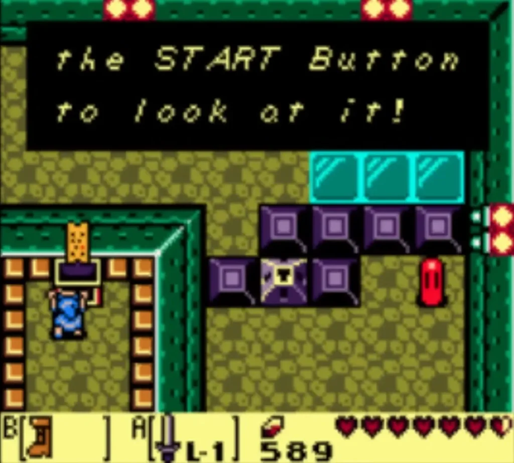 Link by the Dungeon Map chest, with a message box telling him to press START to look at it. Link by the Dungeon Map chest, with a message box telling him to press START to look at it.