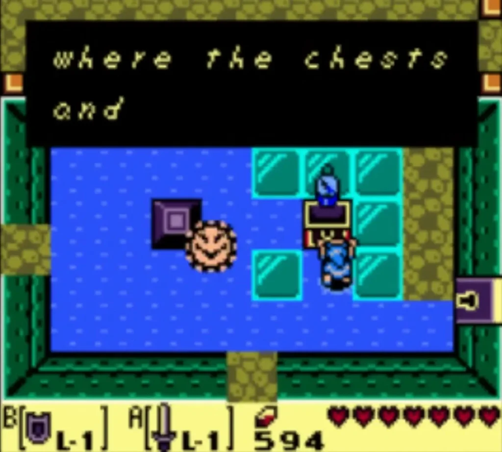 Link by the chest in the water room, with a message box about the chests and keys. Link by the chest in the water room, with a message box about the chests and keys.