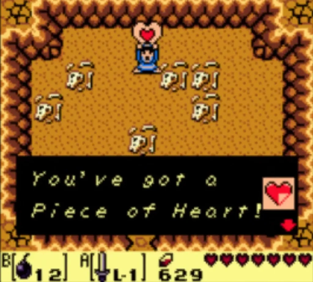 Link in the sand cave with the You have got a Piece of Heart message box on screen. Link in the sand cave with the You have got a Piece of Heart message box on screen.