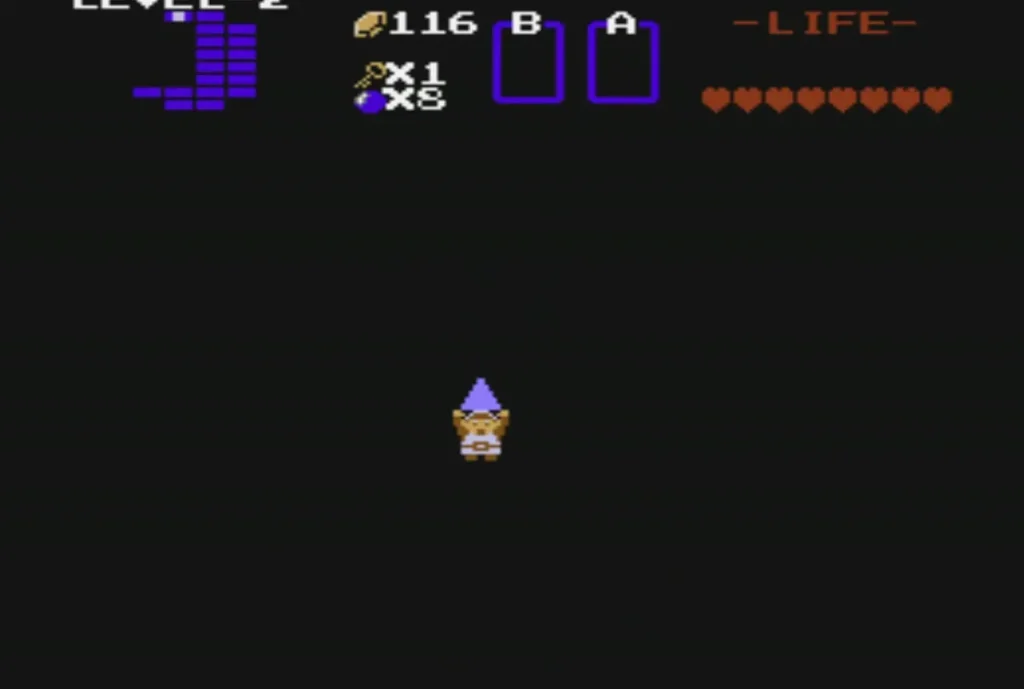 Link holding up a purple Triforce piece in the dark room of Level 2 Link holding up a purple Triforce piece in the dark room of Level 2