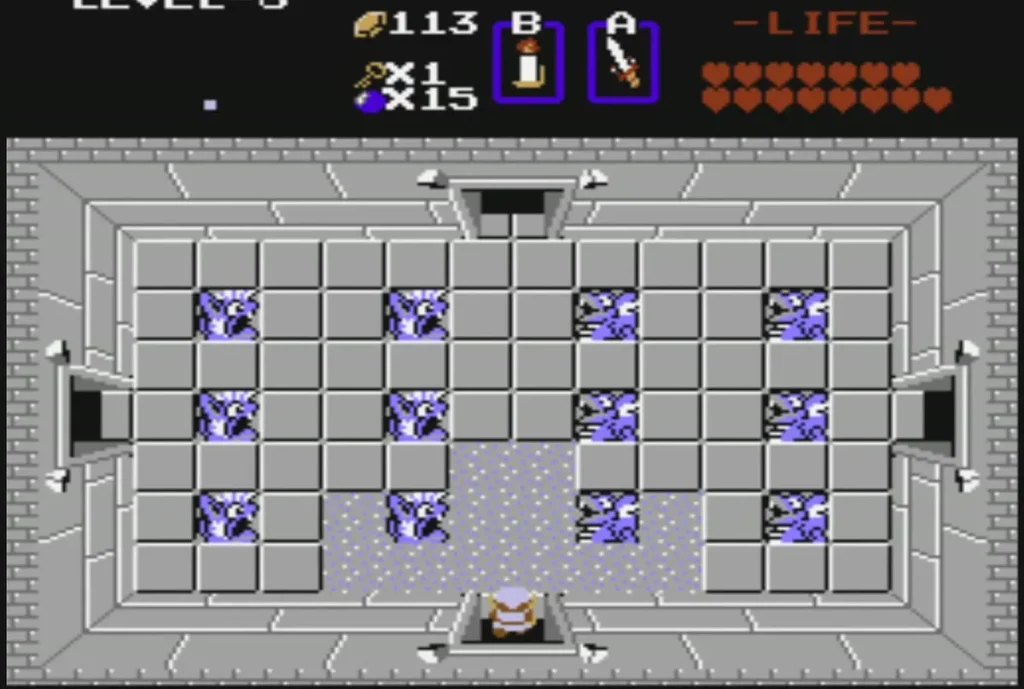 Grey room inside Level 8 with blue statue tiles and Link near the top door Grey room inside Level 8 with blue statue tiles and Link near the top door