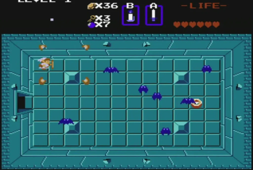 Blue Keese bats flying across a Level 1 block-grid room