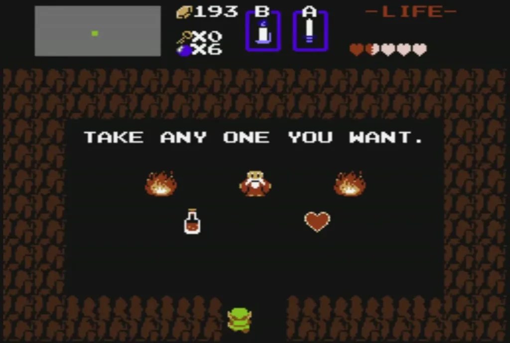 Old Man cave with a Red Potion on the left and a red heart on the right Old Man cave with a Red Potion on the left and a red heart on the right