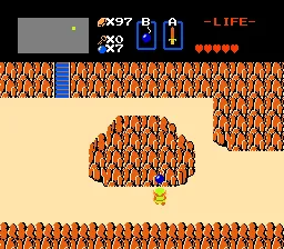 Link beside a brown boulder on the overworld Link beside a brown boulder on the overworld