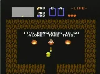 Old Man in the start cave saying it is dangerous to go alone and handing over the Wooden Sword Old Man in the start cave saying it is dangerous to go alone and handing over the Wooden Sword