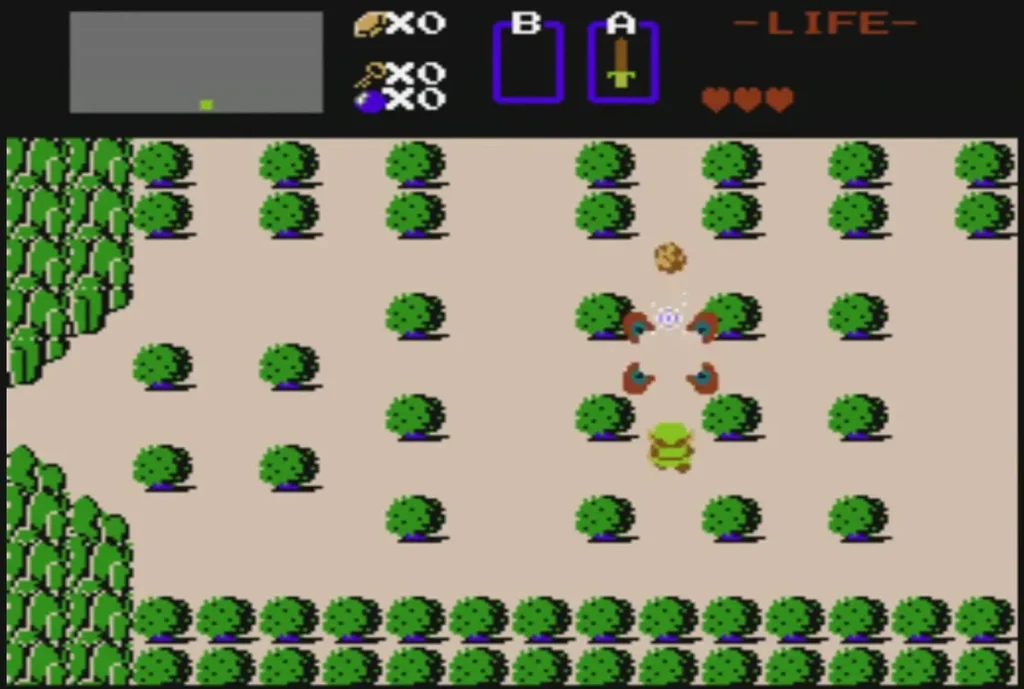 Link walking across a sandy overworld field lined with green bushes