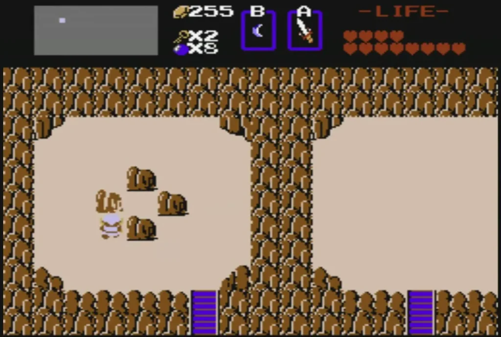 Link beside a cluster of rocks on the sand field Link beside a cluster of rocks on the sand field
