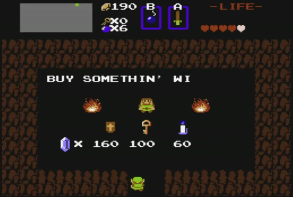 Hidden cave shop with the Magical Shield at 160 rupees beside a key for 100 and a 60-rupee candle Hidden cave shop with the Magical Shield at 160 rupees beside a key for 100 and a 60-rupee candle