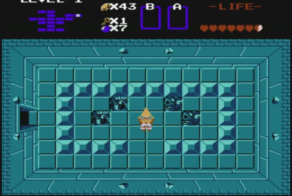 Link raising the Triforce of Wisdom overhead in the dark room of Level 1 Link raising the Triforce of Wisdom overhead in the dark room of Level 1