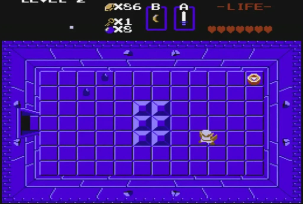 A dungeon item lies on the floor in the top-right corner of a purple Level 2 room A dungeon item lies on the floor in the top-right corner of a purple Level 2 room