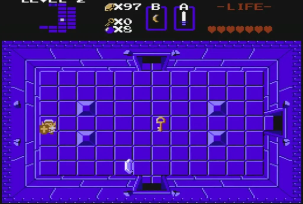 A small key lies on the floor of a purple Level 2 room with Link at the west wall A small key lies on the floor of a purple Level 2 room with Link at the west wall