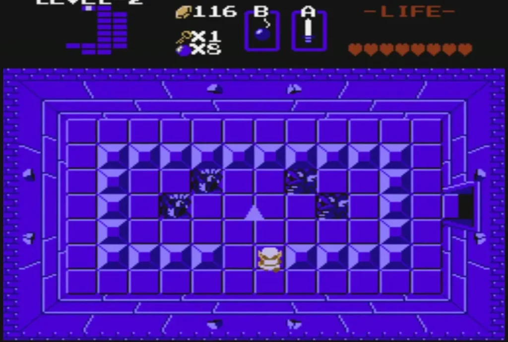 Link walking up to the Triforce piece in a dark purple Level 2 room Link walking up to the Triforce piece in a dark purple Level 2 room