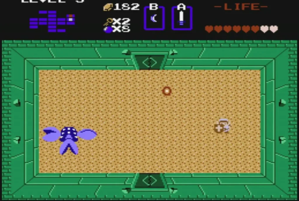 Manhandla with an orange fireball beside it in the sand room