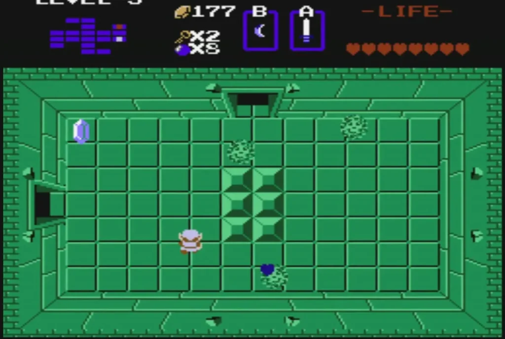 Green room with a block cluster and a blue rupee on the floor after the enemies are cleared
