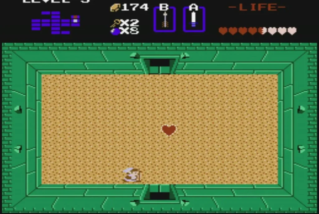 Sand room after the boss fight, with a red heart lying on the floor