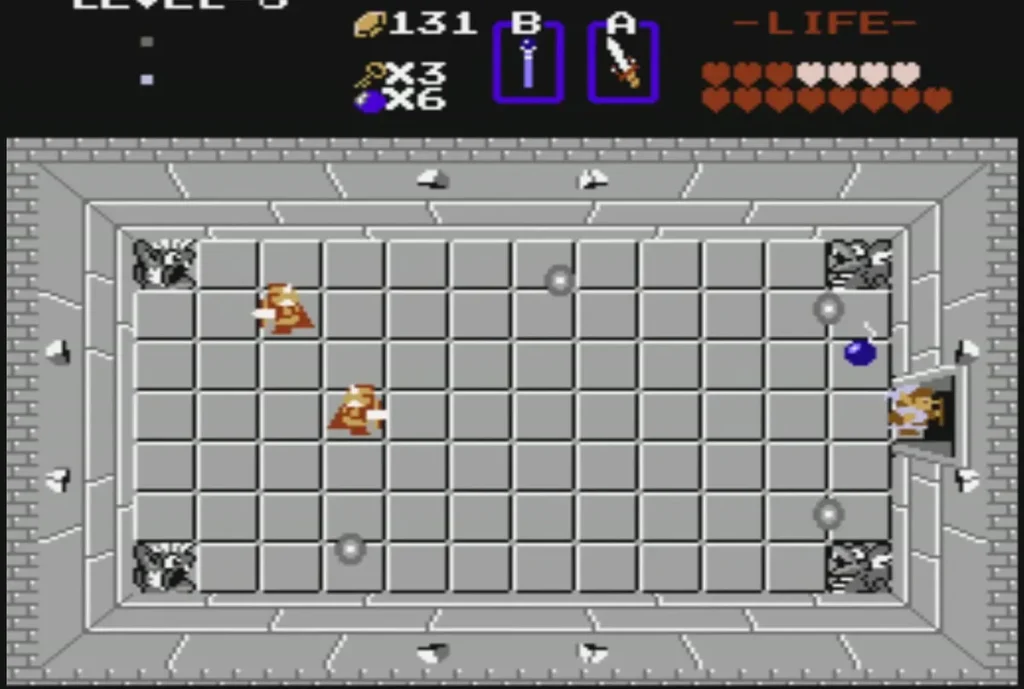Blue bomb lying beside the right door of a Level 8 grey room Blue bomb lying beside the right door of a Level 8 grey room