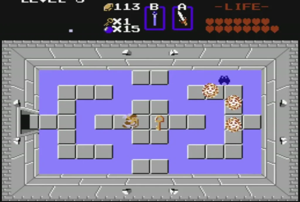 Small key on the purple floor of a Level 8 room with an enemy beside it Small key on the purple floor of a Level 8 room with an enemy beside it