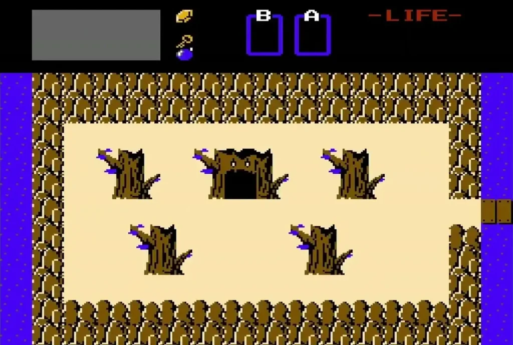 Overworld screen with the dead tree cave and dead trees beside its entrance Overworld screen with the dead tree cave and dead trees beside its entrance