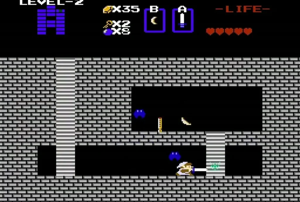 Link swinging his sword at a keese in the gray-brick basement of Level 2 Link swinging his sword at a keese in the gray-brick basement of Level 2