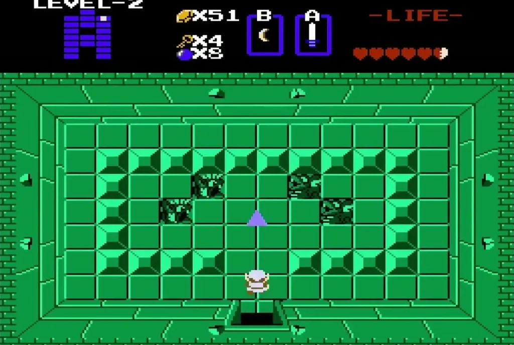 The second Triforce piece lying on the floor of the room above the Gleeok room The second Triforce piece lying on the floor of the room above the Gleeok room