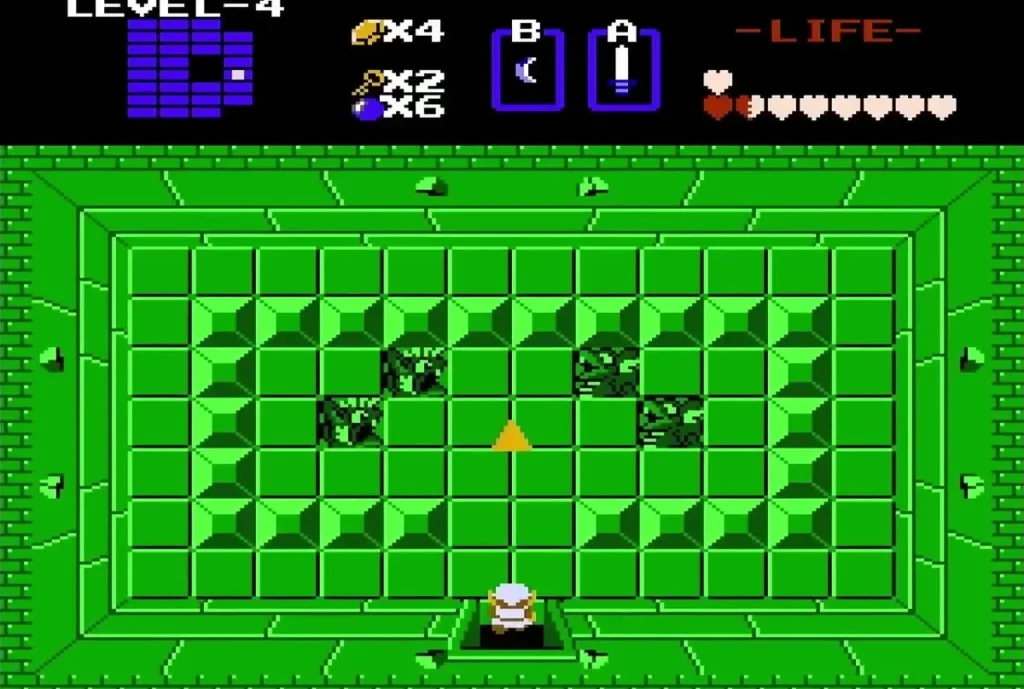 Triforce piece on the floor of the Level 4 Triforce room with Keese around it Triforce piece on the floor of the Level 4 Triforce room with Keese around it