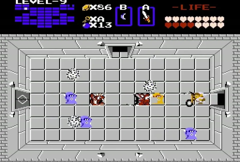 Ghost-like enemies and gold items in a Level 9 room with white blocks Ghost-like enemies and gold items in a Level 9 room with white blocks