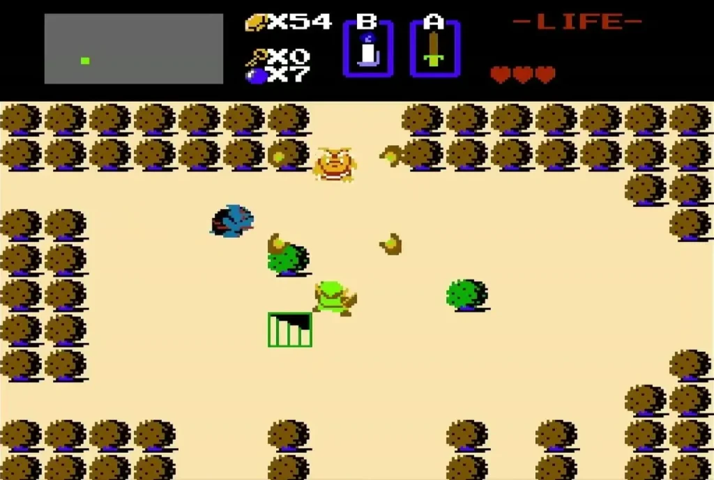Staircase revealed on the sand beside a lone bush after Link burns it, with enemies nearby Staircase revealed on the sand beside a lone bush after Link burns it, with enemies nearby