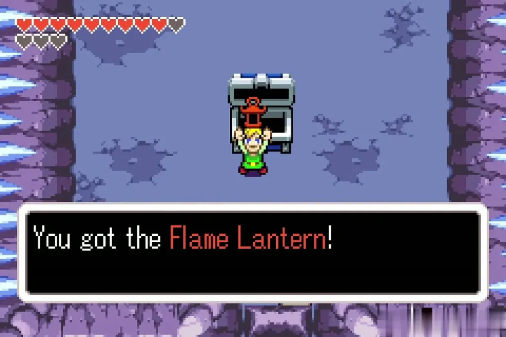 Link holding up the Flame Lantern from the big chest Link holding up the Flame Lantern from the big chest