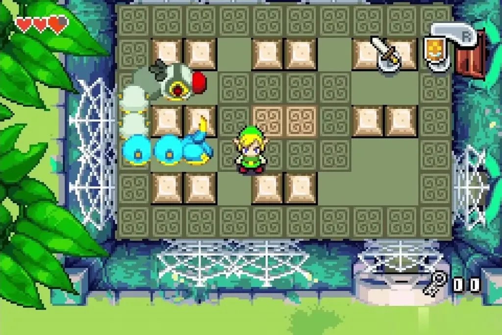 Link running at the Madderpillar's open tail to slash it Link running at the Madderpillar's open tail to slash it