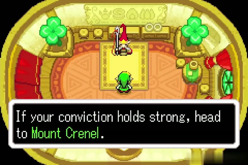 Elder Gentari in his yellow Minish house telling Link to head to Mount Crenel Elder Gentari in his yellow Minish house telling Link to head to Mount Crenel