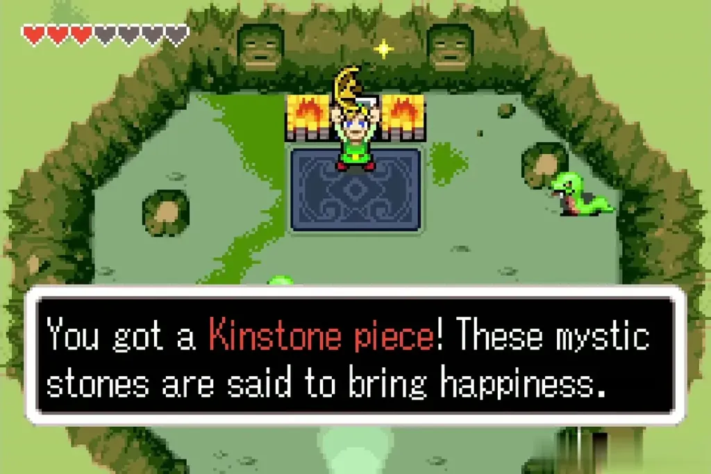 Link holding up a gold Kinstone piece in a Castor Wilds cave Link holding up a gold Kinstone piece in a Castor Wilds cave