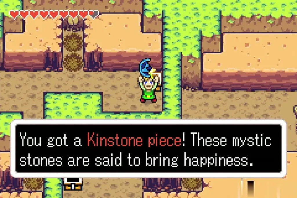 The message: You got a Kinstone piece! with Link holding up a blue piece The message: You got a Kinstone piece! with Link holding up a blue piece