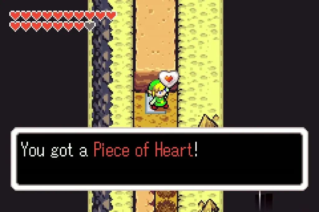 Link holding up the Piece of Heart on the narrow Veil Falls ledge Link holding up the Piece of Heart on the narrow Veil Falls ledge