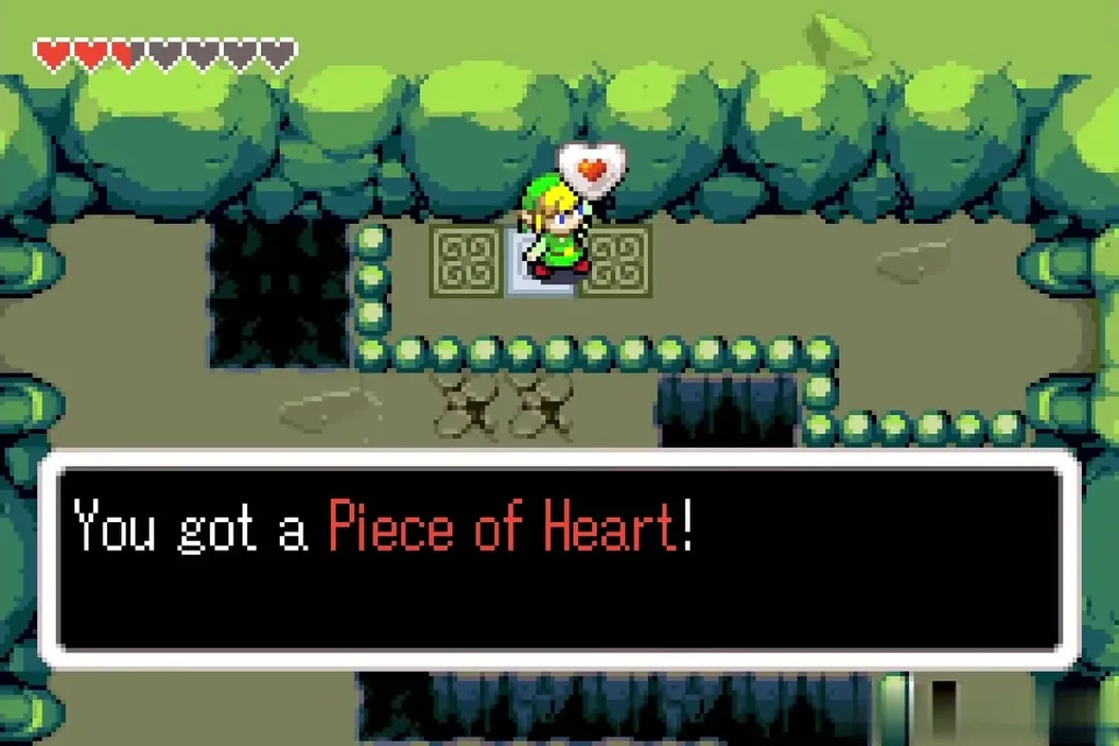 Link holding up the Piece of Heart in the Wind Ruins cave Link holding up the Piece of Heart in the Wind Ruins cave