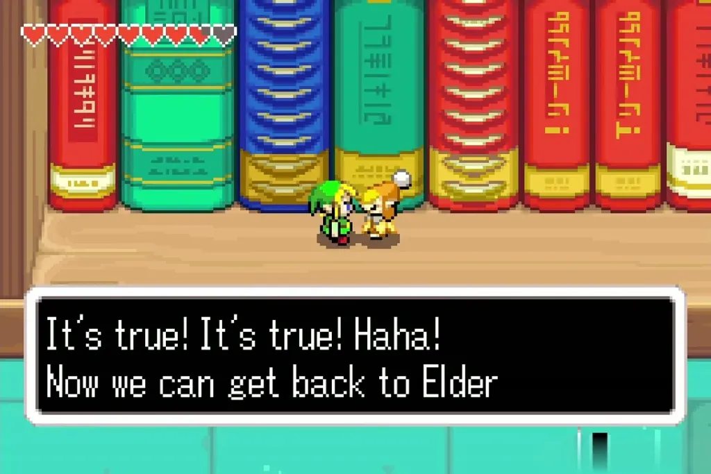 Minish Librari beside the bookshelves thanking Link for returning the books