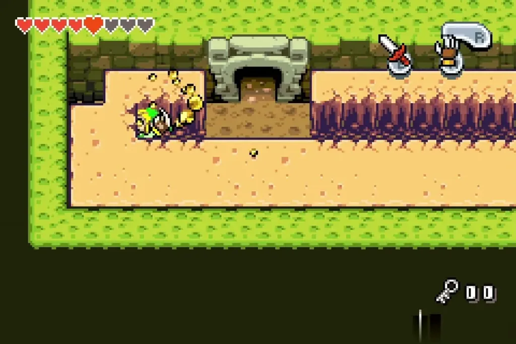 Link kicking up sand with the Mole Mitts beside the sand ledge in the Fortress of Winds