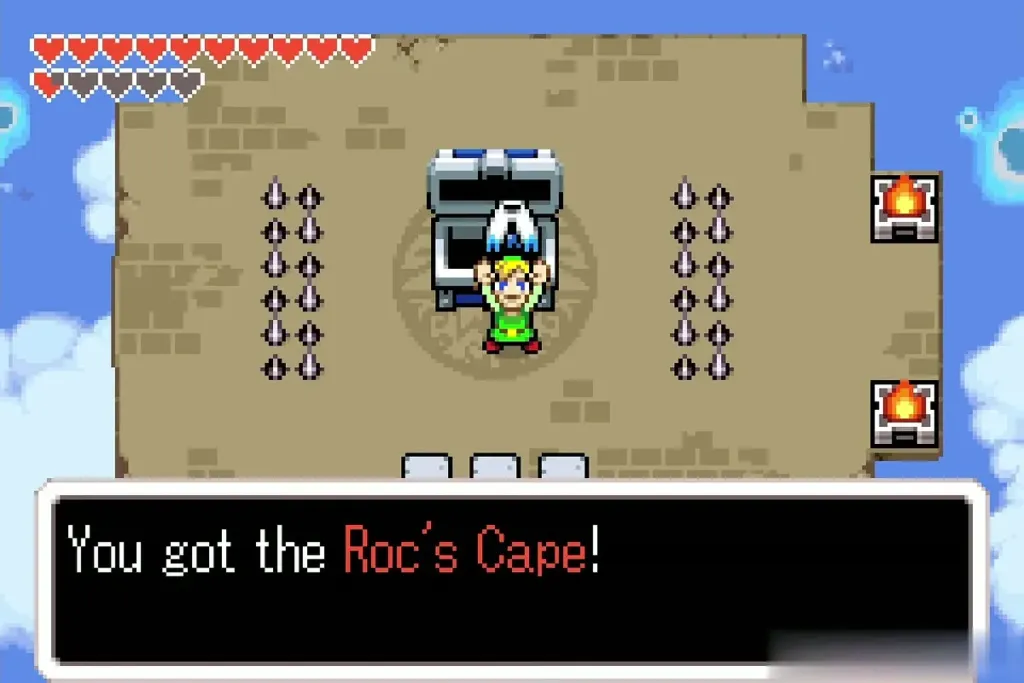 Link holding up Roc's Cape after the item-get message in the Palace of Winds chest room