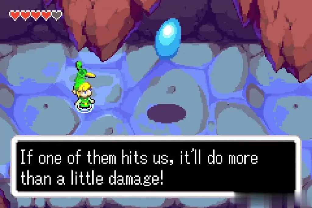 Minish Link under a giant raindrop with Ezlo warning one hit does more than a little damage Minish Link under a giant raindrop with Ezlo warning one hit does more than a little damage