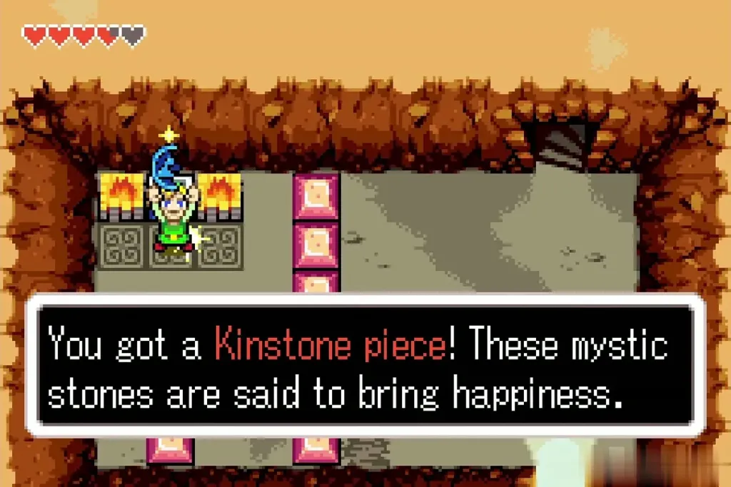 Link holding up a Kinstone piece with the message You got a Kinstone piece Link holding up a Kinstone piece with the message You got a Kinstone piece