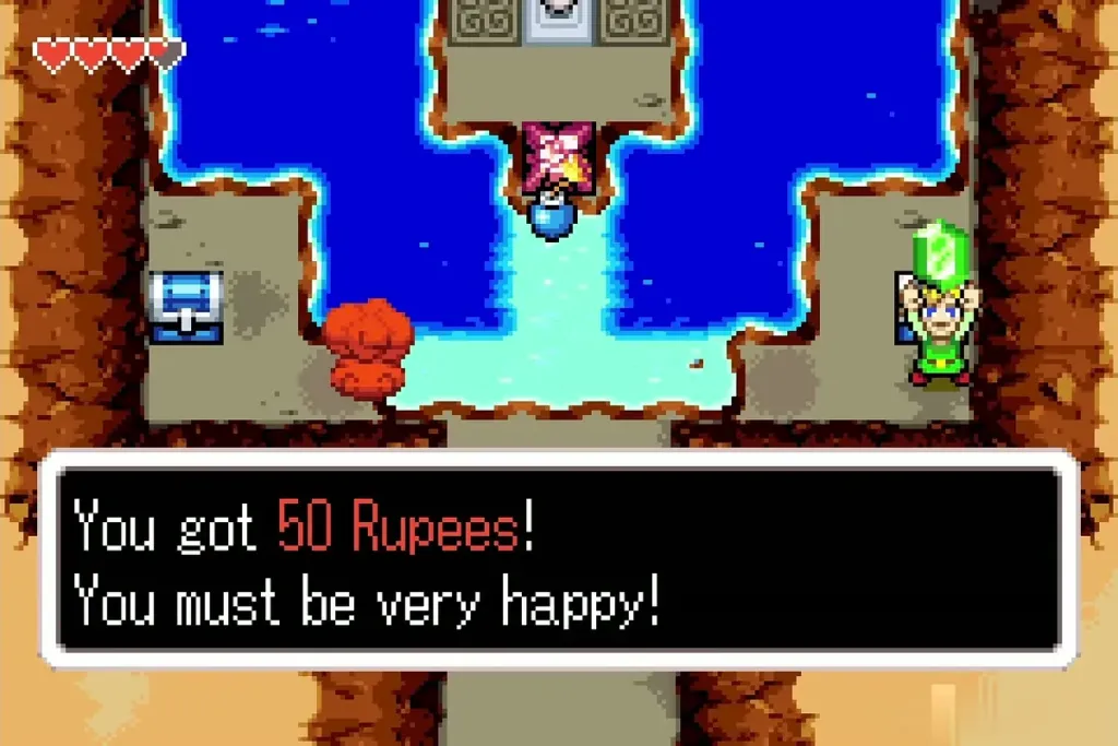 Link holding up a 50 Rupee gem in the water cave Link holding up a 50 Rupee gem in the water cave