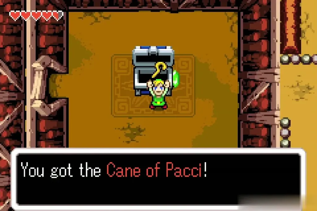 Link holding up the Cane of Pacci over a big chest Link holding up the Cane of Pacci over a big chest