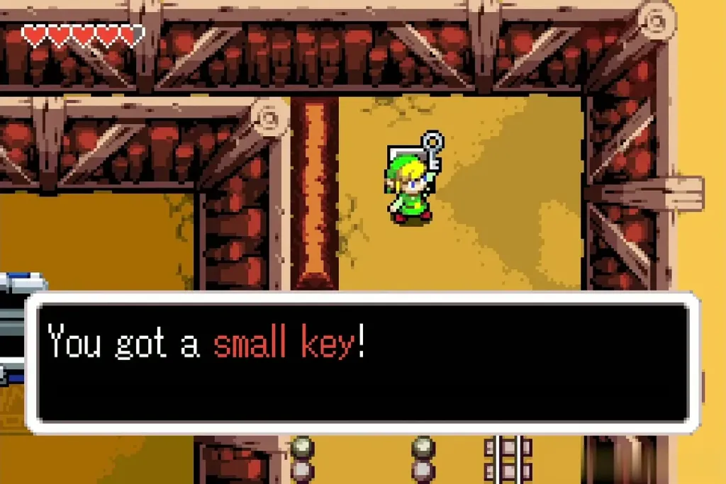 Link holding up the second Small Key with the message fully shown Link holding up the second Small Key with the message fully shown