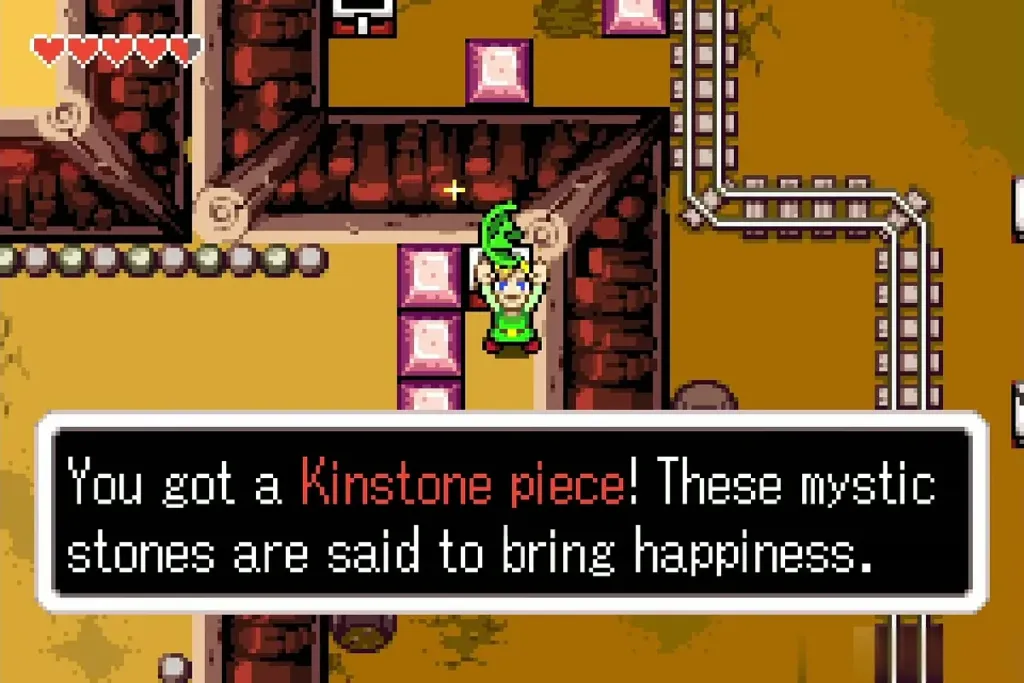 Link holding up a Kinstone piece with the full message box Link holding up a Kinstone piece with the full message box