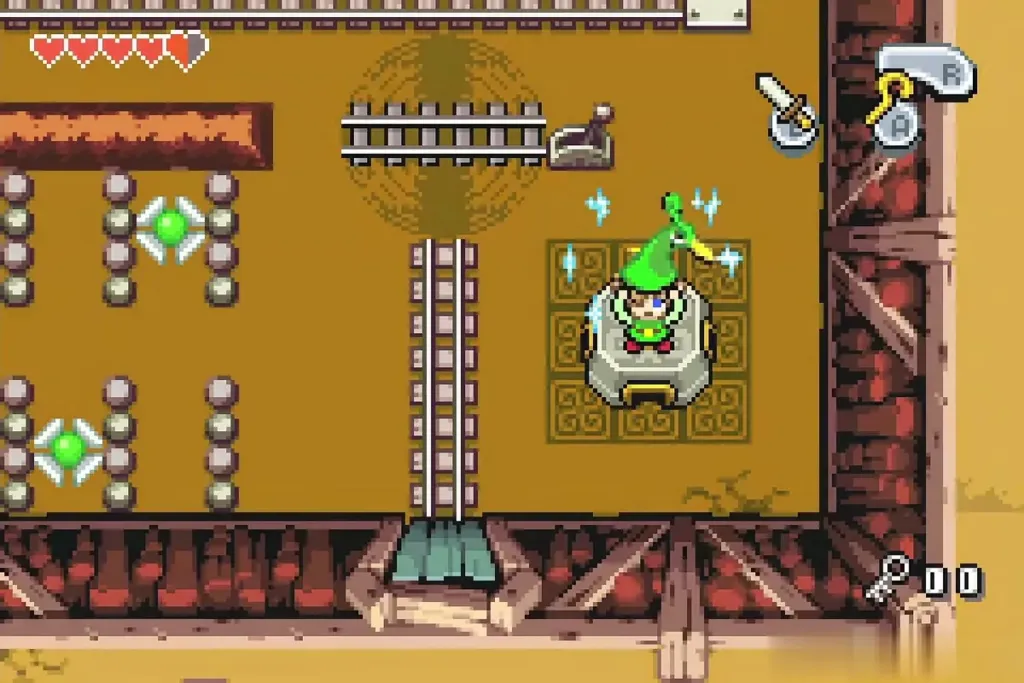 Link shrinking on the Minish Portal beside the mine cart track Link shrinking on the Minish Portal beside the mine cart track