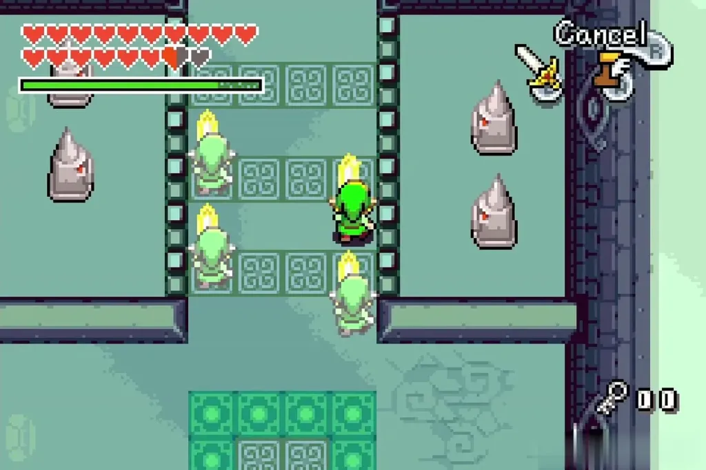 Link and three clones lined up on the floor slabs between spike traps Link and three clones lined up on the floor slabs between spike traps