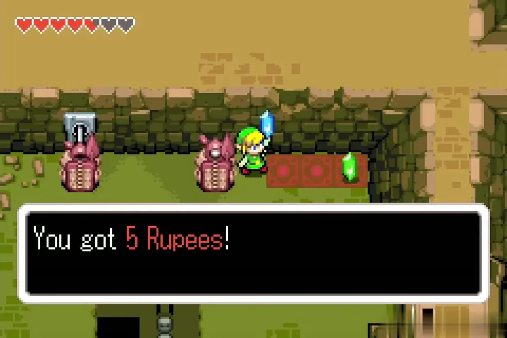 Link holding up a blue rupee with the You got 5 Rupees message Link holding up a blue rupee with the You got 5 Rupees message