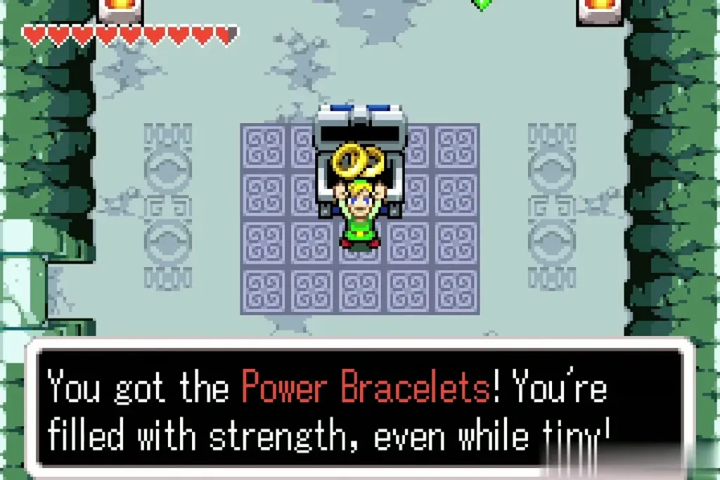 Link holding up the Power Bracelets with the item message on screen Link holding up the Power Bracelets with the item message on screen