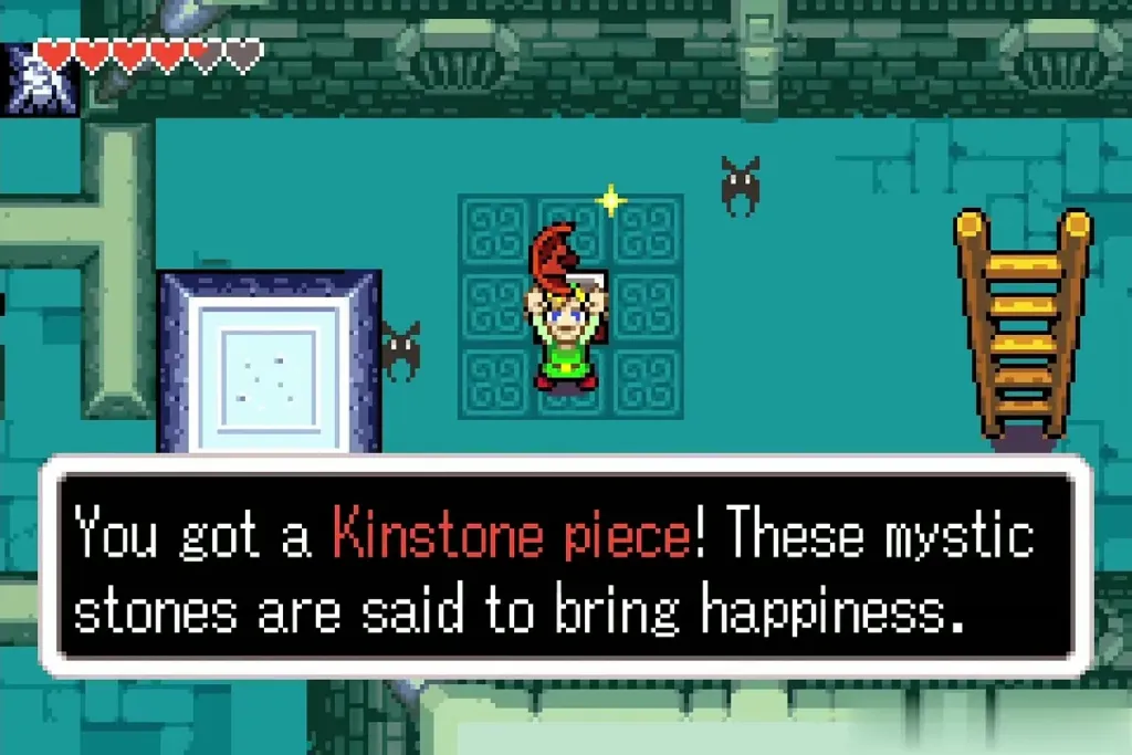 Link holding up a Kinstone piece in the cave