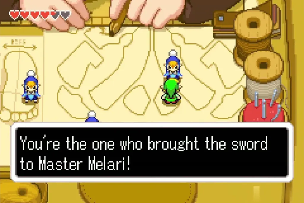 Link talks to a tiny Minish on Rem's workbench